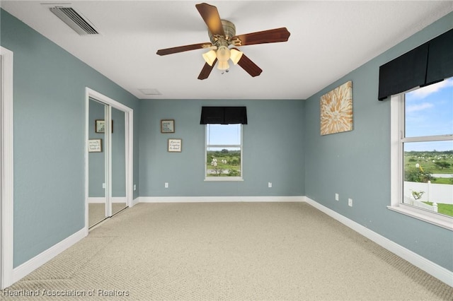 3038 Cedora Ter, Sebring, FL 33870 - unfurnished room with light carpet and ceiling fan
