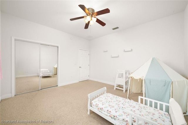 3038 Cedora Ter, Sebring, FL 33870 - bedroom with carpet floors, ceiling fan, and a closet