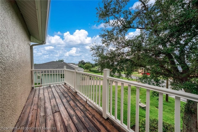 3038 Cedora Ter, Sebring, FL 33870 - wooden deck featuring a lawn