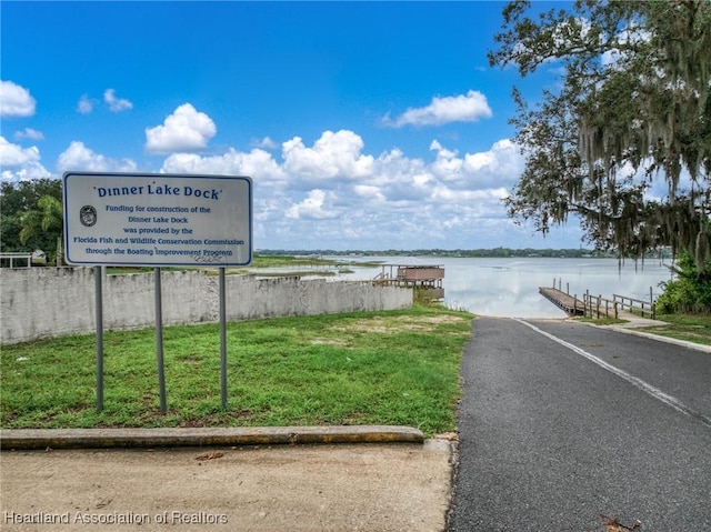3038 Cedora Ter, Sebring, FL 33870 - water view featuring a boat ramp