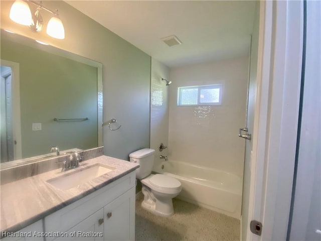 bathroom with visible vents, toilet, vanity, and shower / tub combination