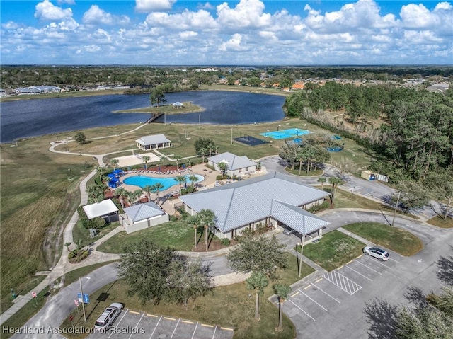 drone / aerial view with a water view