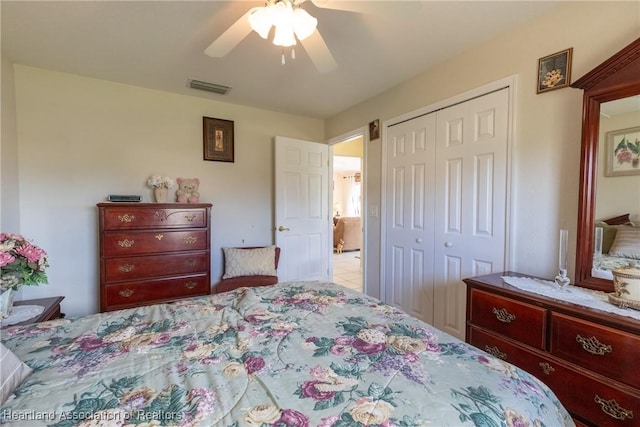 bedroom with a closet and ceiling fan