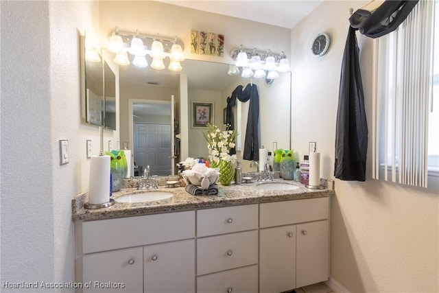 bathroom featuring vanity