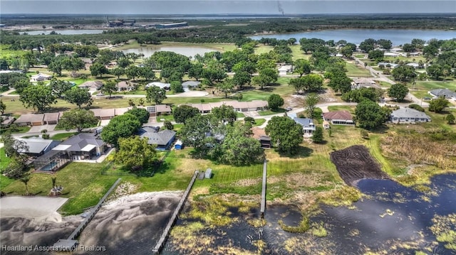 aerial view featuring a residential view and a water view