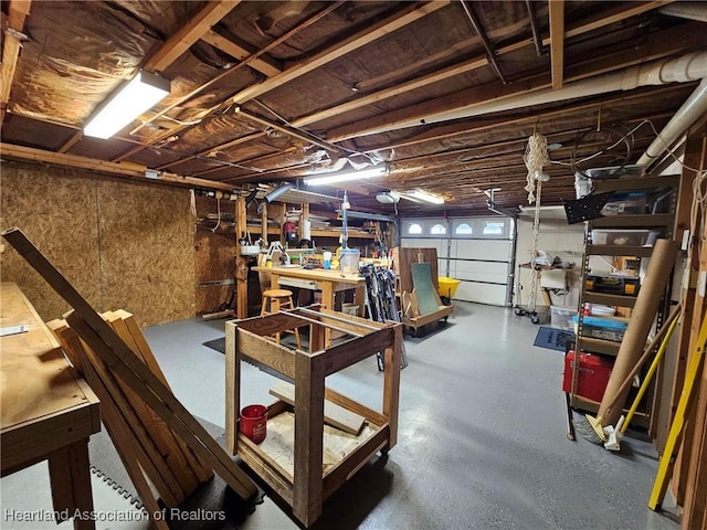 basement with a workshop area