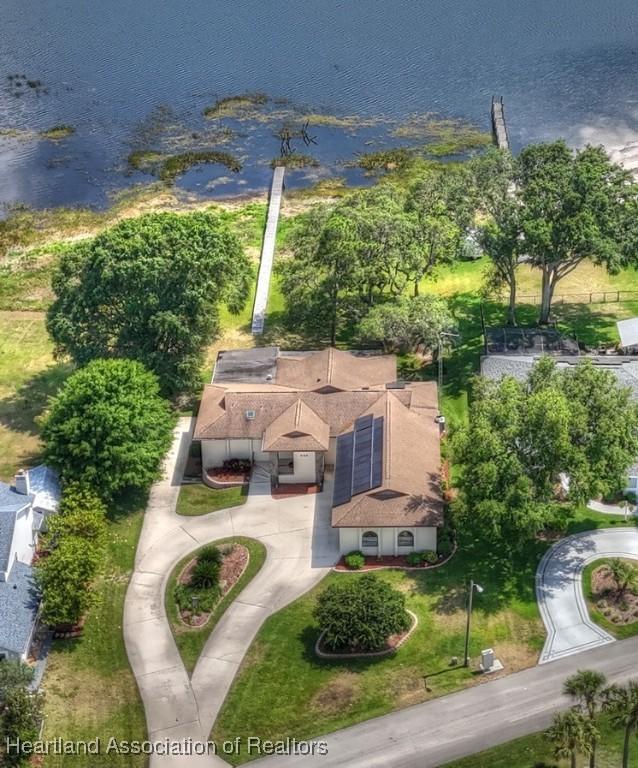 bird's eye view with a water view