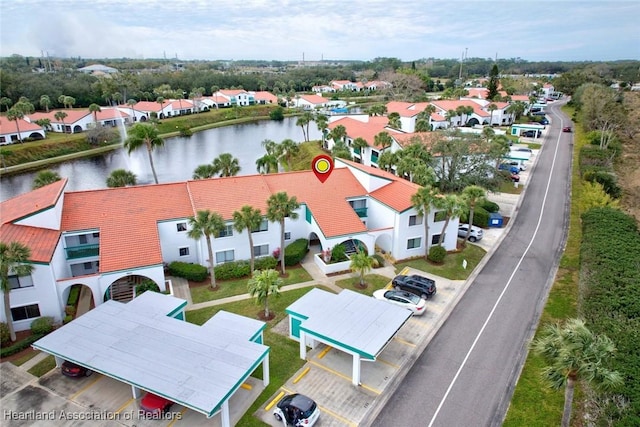 drone / aerial view with a water view