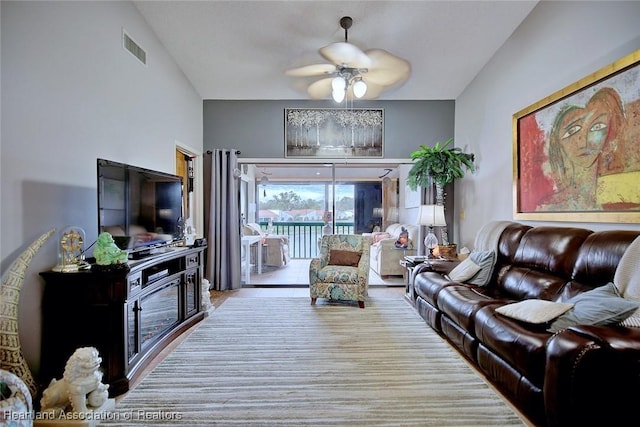 living room featuring ceiling fan