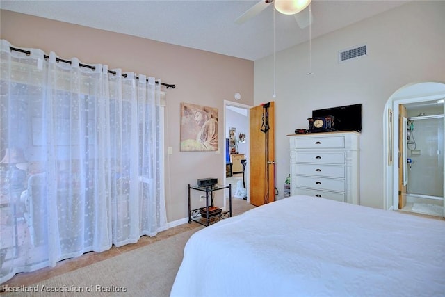 bedroom featuring ceiling fan and connected bathroom