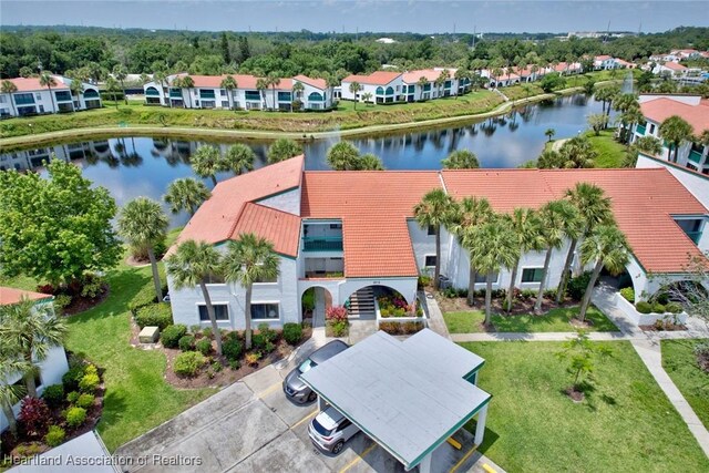 4915 Casablanca Cir Unit H22, Sebring, FL 33870 - aerial perspective of suburban area featuring a nearby body of water