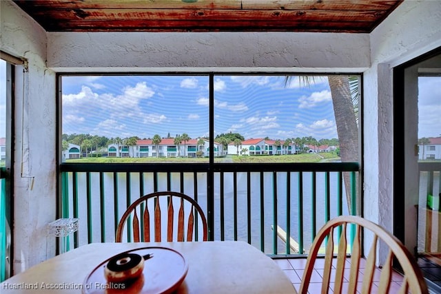 4915 Casablanca Cir Unit H22, Sebring, FL 33870 - sunroom / solarium featuring plenty of natural light and a residential view