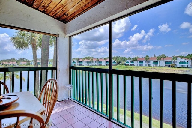 4915 Casablanca Cir Unit H22, Sebring, FL 33870 - sunroom with lofted ceiling and a residential view
