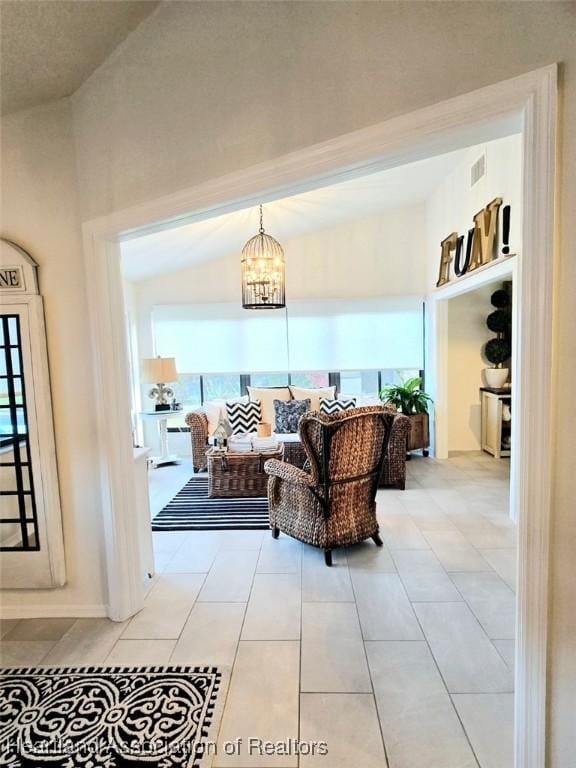 2919 Summertree Dr, Sebring, FL 33872 - living area featuring visible vents, an inviting chandelier, and tile patterned flooring