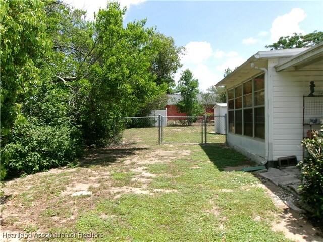 1618 Roberta Ave, Sebring, FL 33870 - view of yard featuring a gate