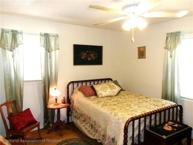 1618 Roberta Ave, Sebring, FL 33870 - bedroom with multiple windows and ceiling fan