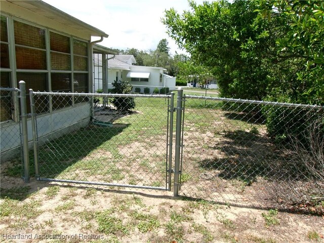 1618 Roberta Ave, Sebring, FL 33870 - view of yard featuring a gate