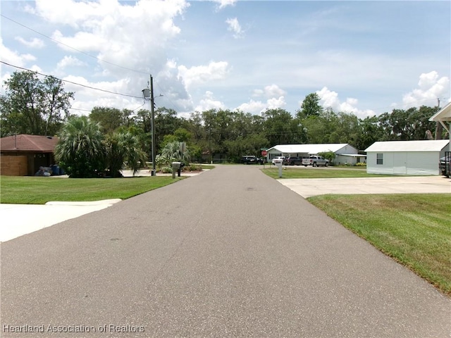 1618 Roberta Ave, Sebring, FL 33870 - view of asphalt street with street lighting