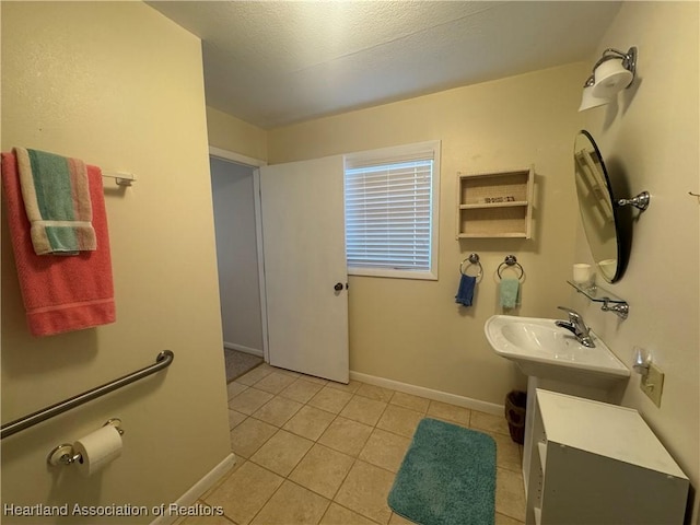 bathroom featuring tile patterned flooring