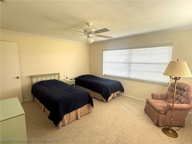 carpeted bedroom featuring multiple windows, a textured ceiling, ceiling fan, and ornamental molding