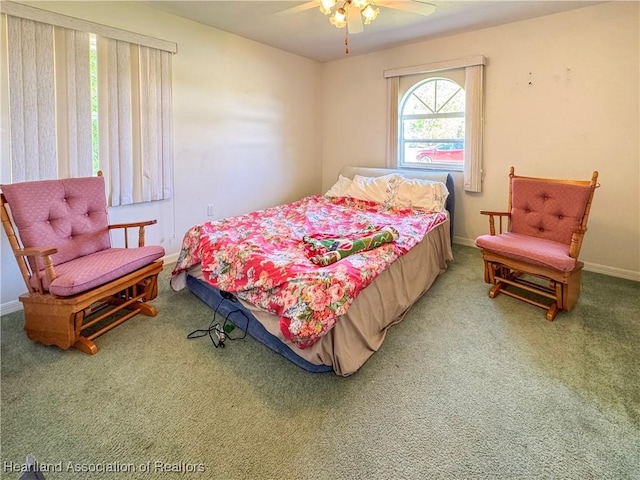 120 Honeycomb Ave, Lake Placid, FL 33852 - carpeted bedroom with a ceiling fan and baseboards