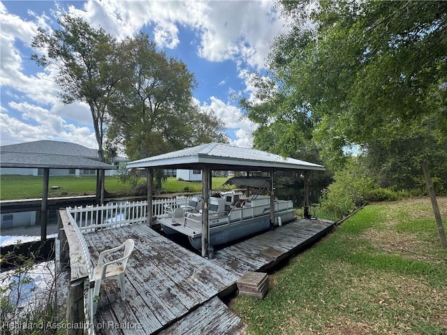 dock area with a lawn