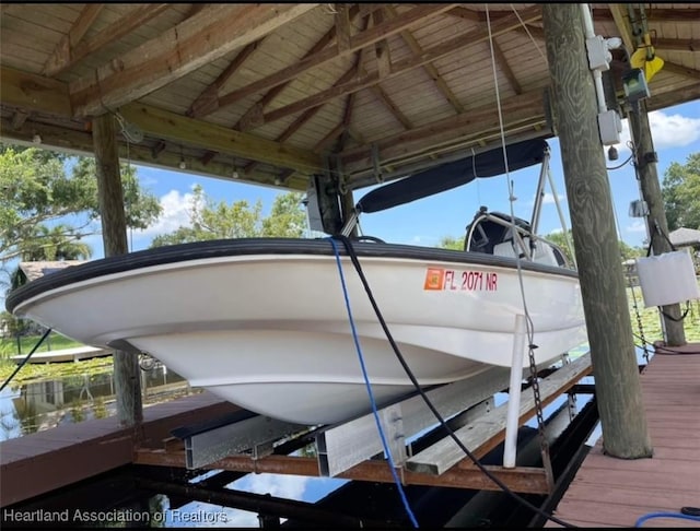 131 Temptation Ct, Lake Placid, FL 33852 - dock with boat lift