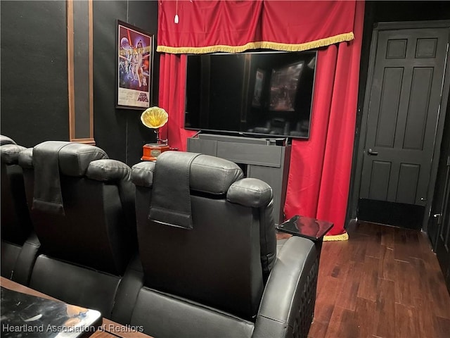 home theater featuring wood finished floors