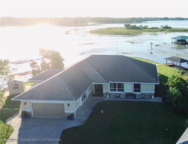 drone / aerial view featuring a water view