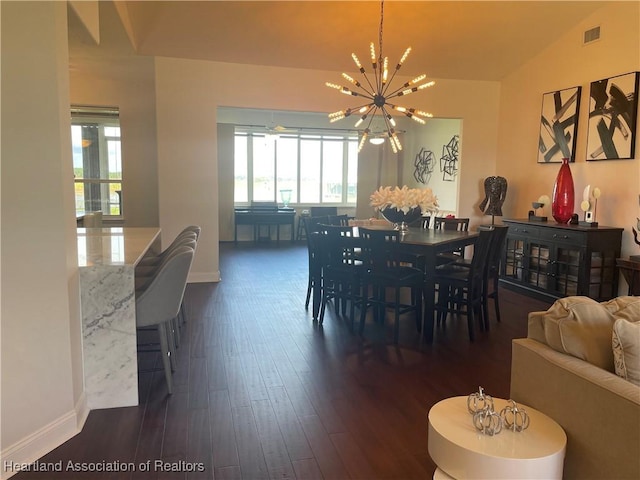 dining room featuring visible vents, baseboards, dark wood finished floors, lofted ceiling, and an inviting chandelier