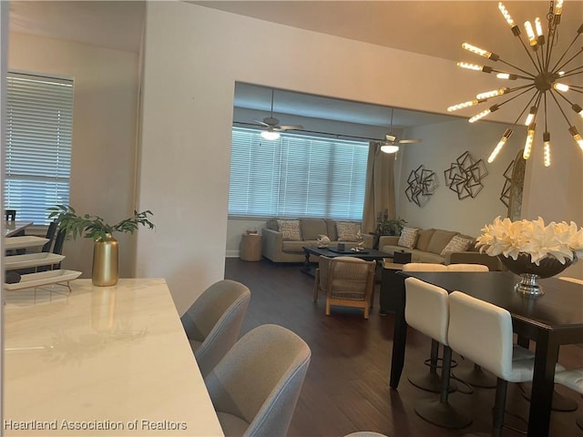131 Temptation Ct, Lake Placid, FL 33852 - living room featuring dark wood-style flooring and a chandelier