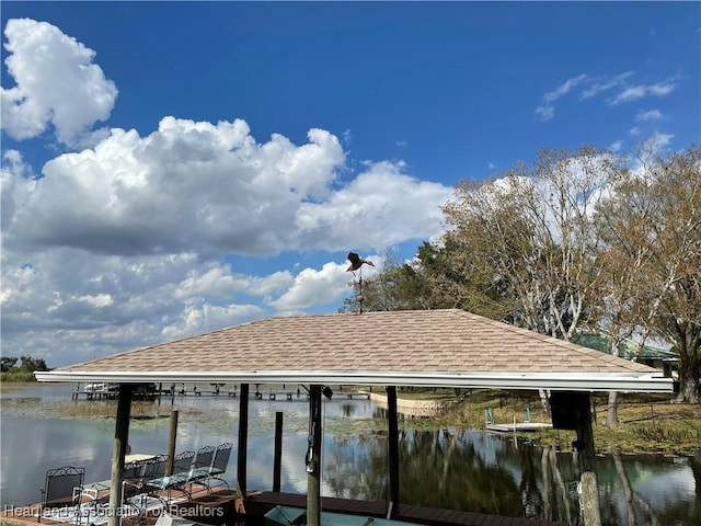 dock area featuring a water view