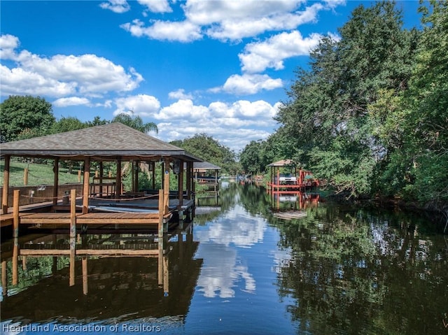 dock area featuring a water view