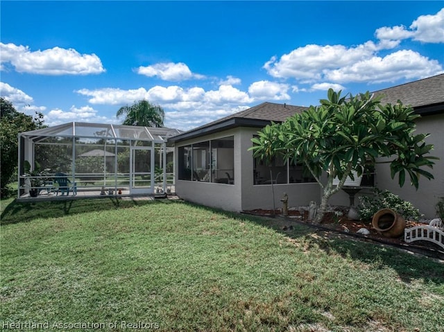 view of yard featuring a lanai