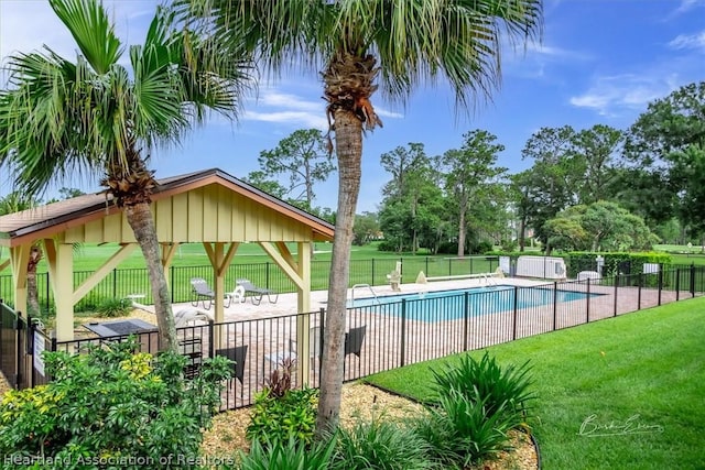 view of pool with a gazebo, a yard, and a patio