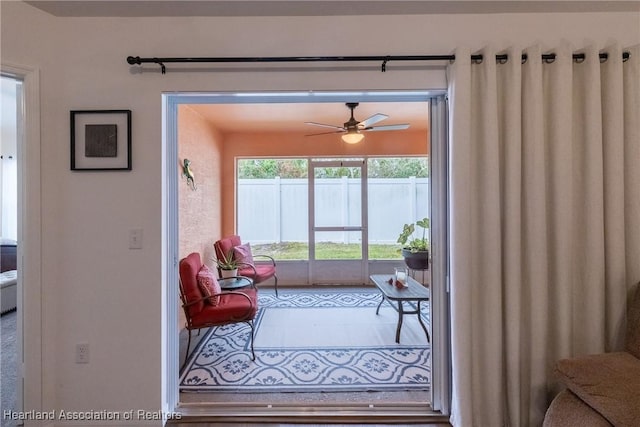 interior space featuring ceiling fan