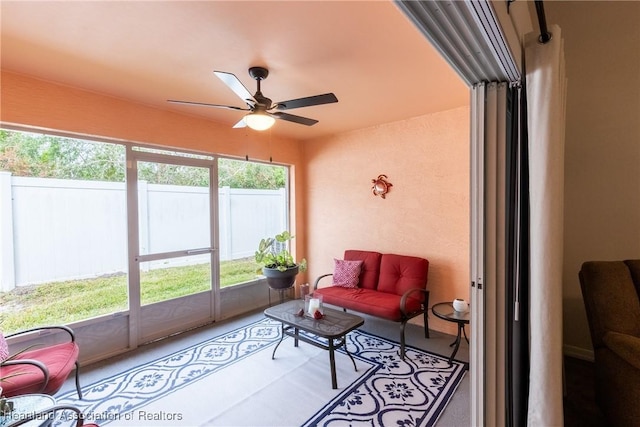 sunroom / solarium with ceiling fan