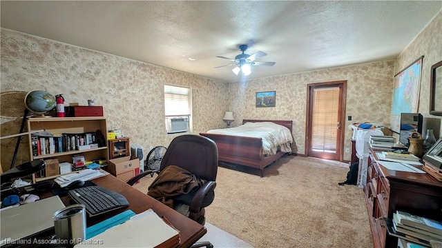 bedroom with light carpet, cooling unit, a textured ceiling, and ceiling fan