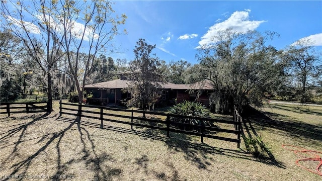 exterior space with a rural view