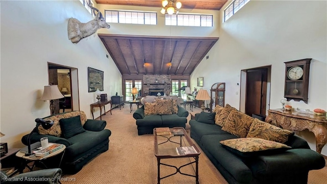 living room featuring a stone fireplace, light colored carpet, wooden ceiling, and a healthy amount of sunlight