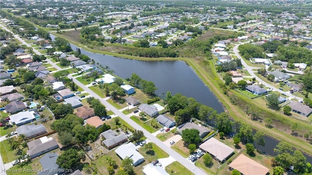 751 Grenada St, Port St Lucie, FL 34983 - aerial overview of property's location with a large body of water and nearby suburban area