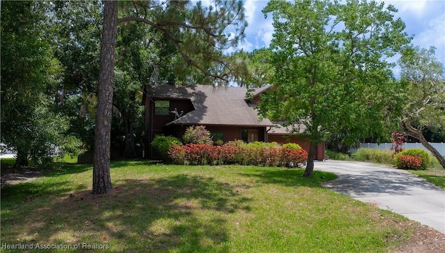 751 Grenada St, Port St Lucie, FL 34983 - view of front of house featuring concrete driveway and a garage
