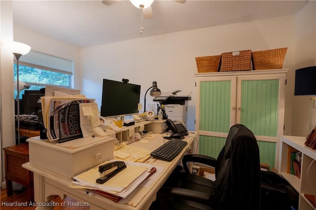 751 Grenada St, Port St Lucie, FL 34983 - office featuring a ceiling fan, wood finished floors, and a textured ceiling