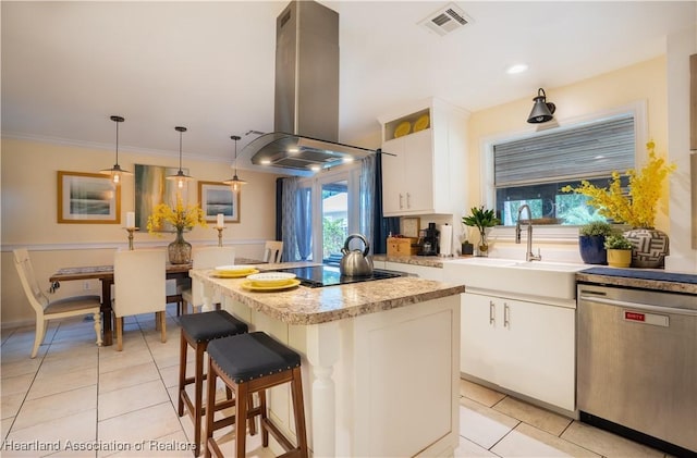 751 Grenada St, Port St Lucie, FL 34983 - kitchen with stainless steel dishwasher, island exhaust hood, black electric cooktop, a sink, and light tile patterned floors