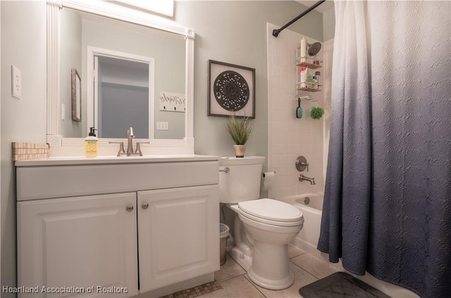 751 Grenada St, Port St Lucie, FL 34983 - bathroom featuring tile patterned flooring, vanity, toilet, and shower / bath combination with curtain