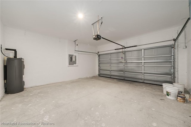 garage with a garage door opener, electric panel, and water heater