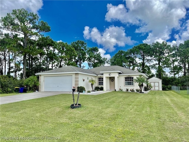 view of front of home featuring fence, an attached garage, stucco siding, concrete driveway, and a front lawn