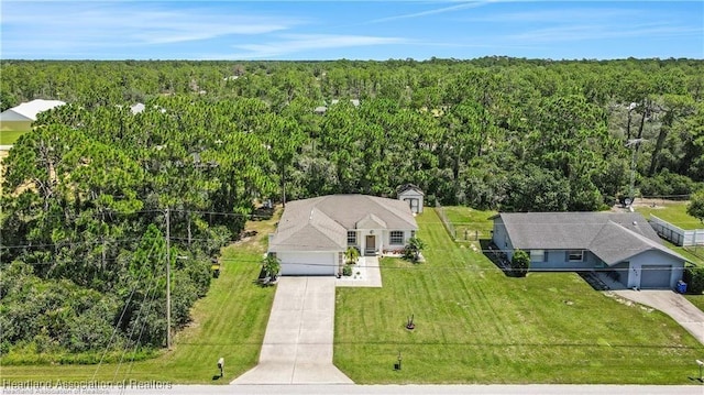 aerial view featuring a view of trees