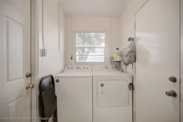 laundry area featuring washing machine and clothes dryer