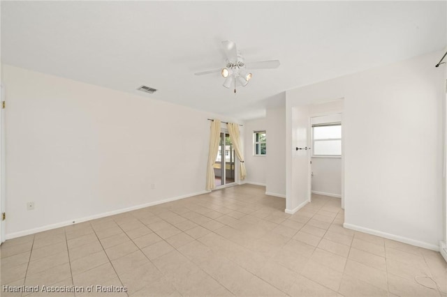 3912 Lafayette Ave, Sebring, FL 33875 - spare room featuring ceiling fan, baseboards, and light tile patterned floors